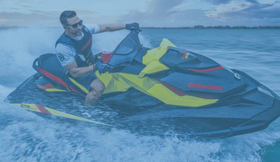 Rider on a yellow and black jet ski